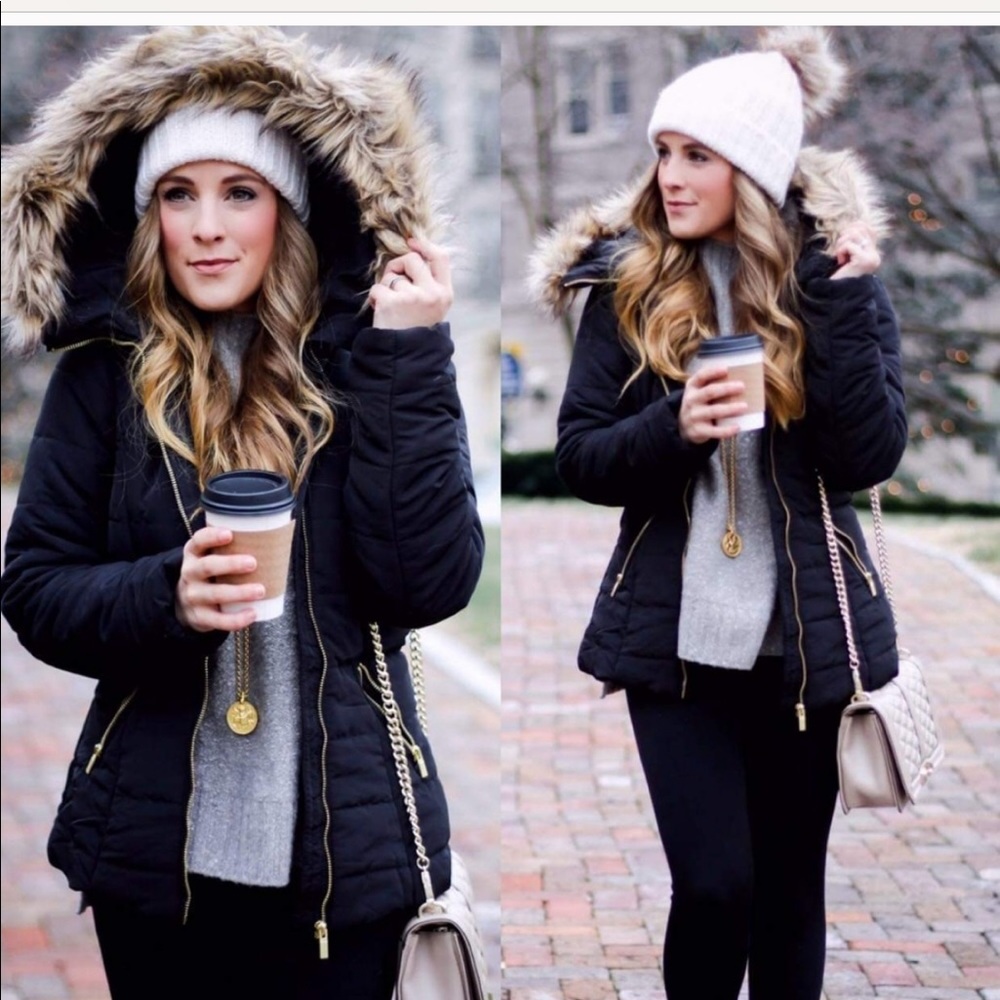 Black winter puffer jacket with faux fur hood